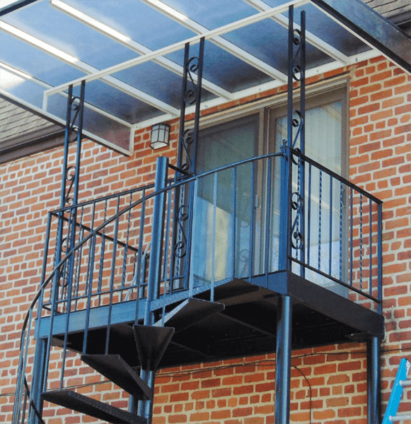 A balcony with stairs and a window.